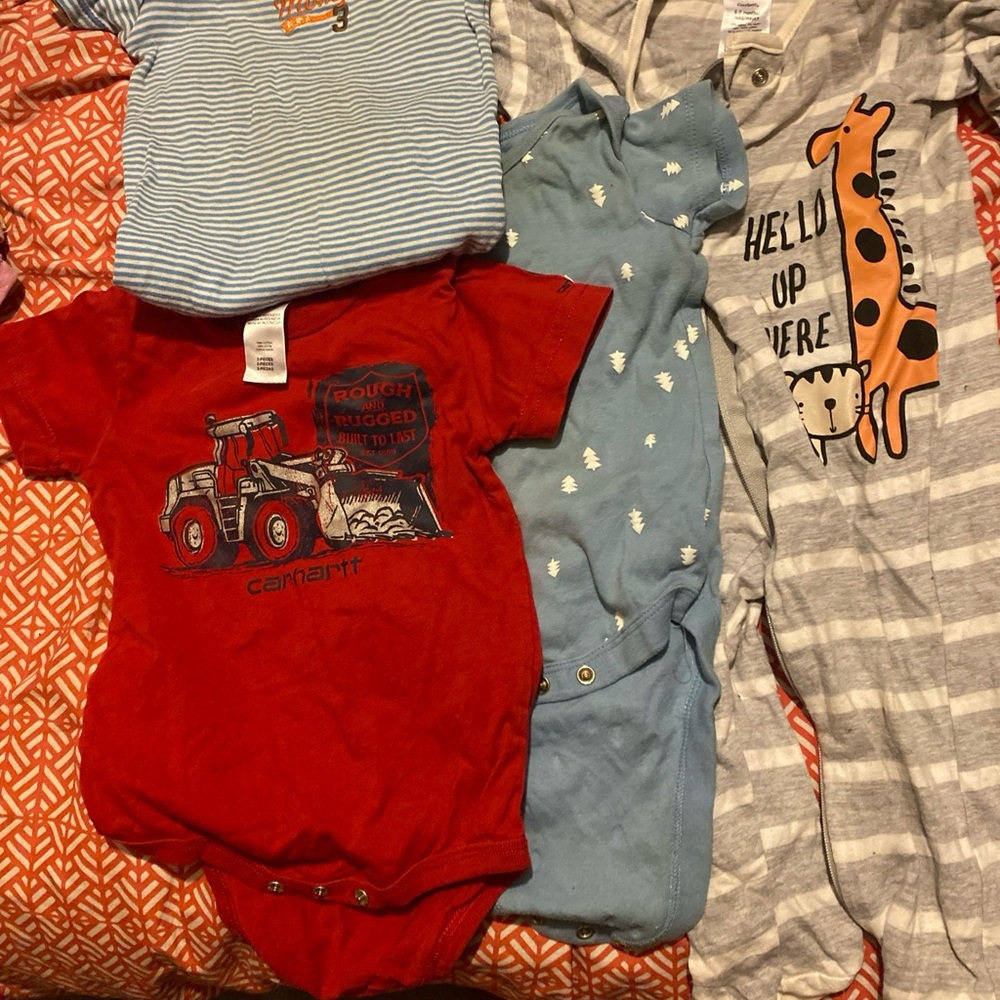4 Baby one piece suits, catrhartt, gerber and child of mine $5 each